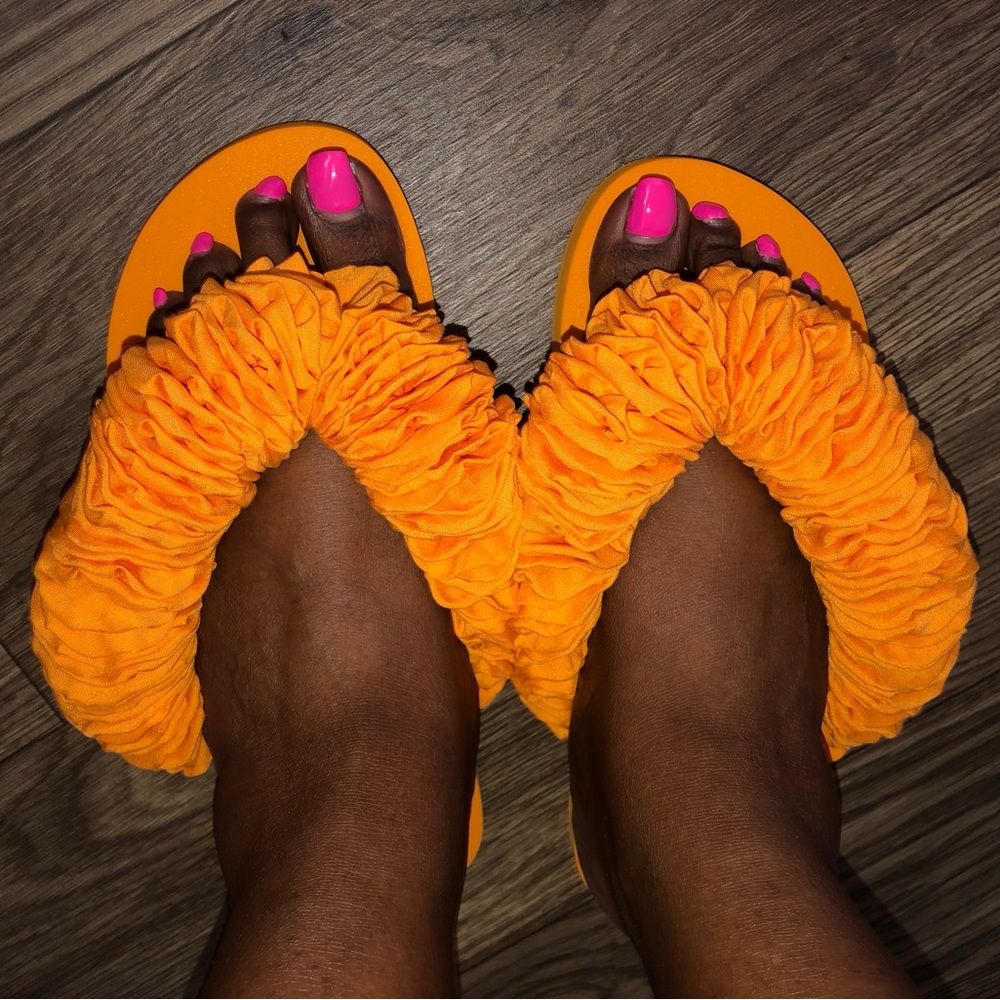 Tory Burch yo-yo flip flops
